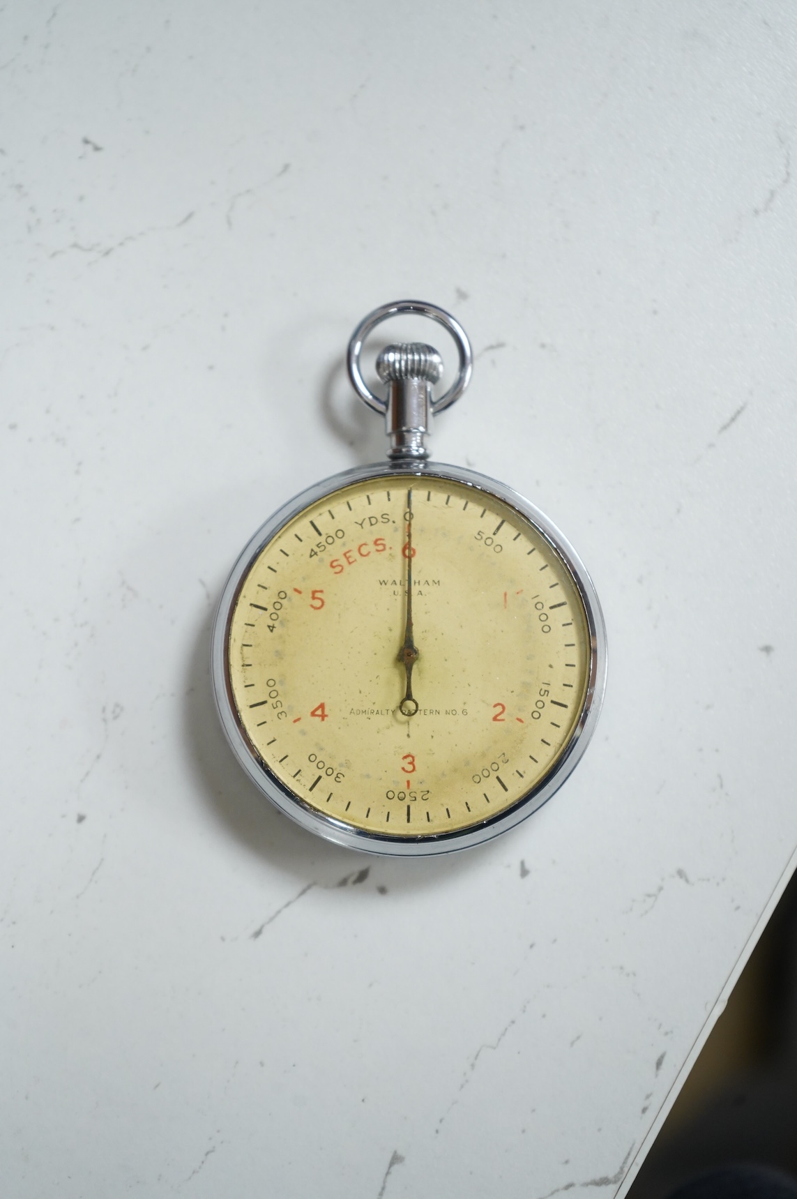 An Asdic military stopwatch by Waltham, U.S.A., Admiralty Pattern No.6, engraved to the reverse with broad arrow and; ‘Patt. 6, U12046’, retains inner dust cover